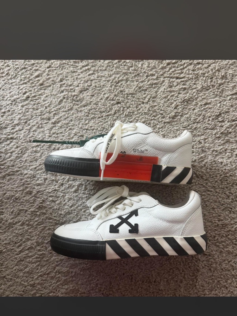 Off-White  White Leather Sneakers with Black Striped Sole and Orange accent
